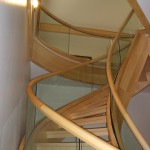 Curved Glass Banisters supporting the handrails