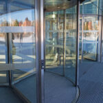 Bent Glass Design provides glass designs for revolving glass doors