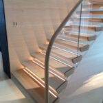 Stair case glass railing